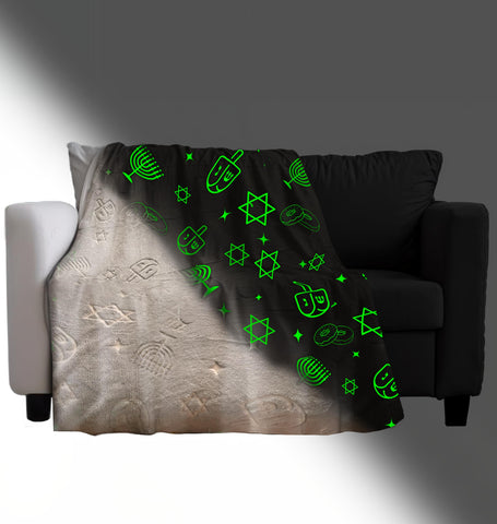 GUARDMAN blanket draped on sofa adding holiday decor and comfy seating