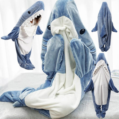 Person wearing Gudina shark blanket on couch enjoying hands-free comfort
