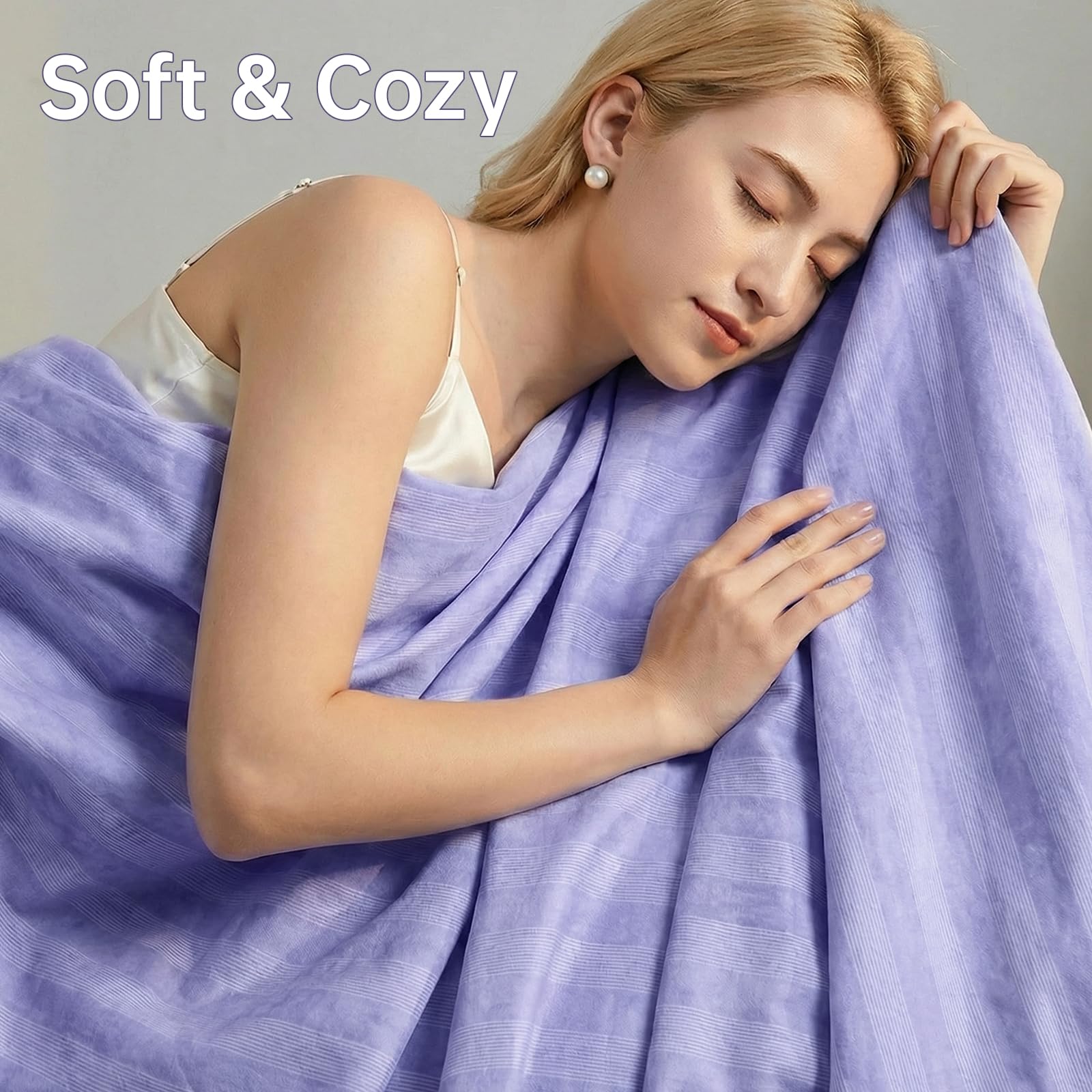 Guohaoi blanket spread on queen bed demonstrating roomy coverage