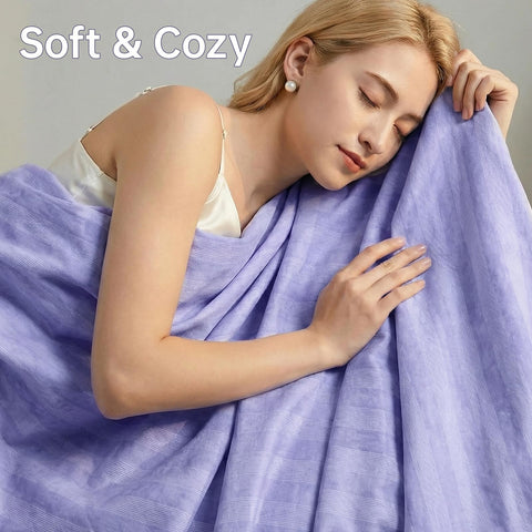 Guohaoi blanket spread on queen bed demonstrating roomy coverage