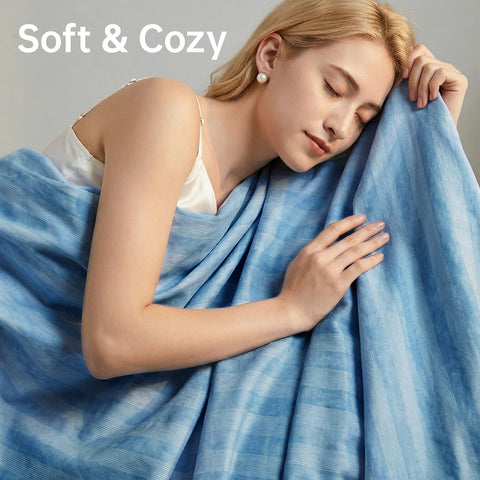 Guohaoi blanket size comparison with pillow showing generous queen coverage