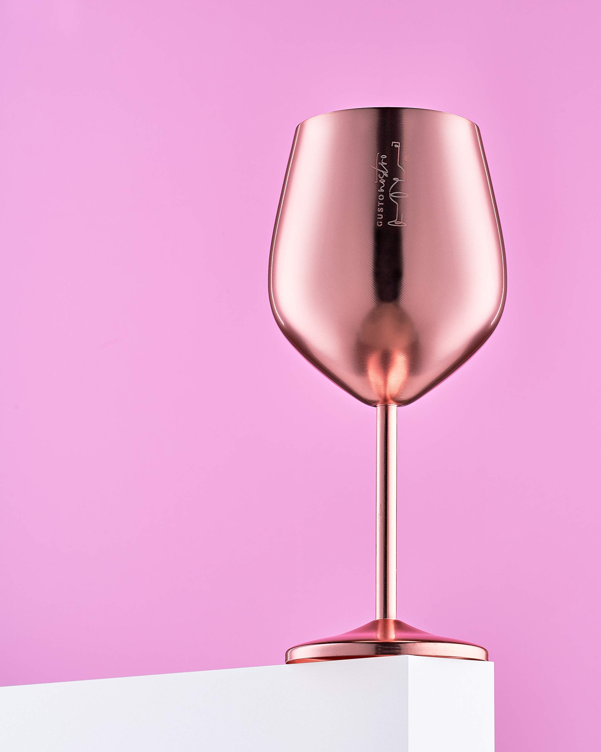 Gusto Nostro two glasses on table in lifestyle shot showing elegant outdoor entertaining benefit