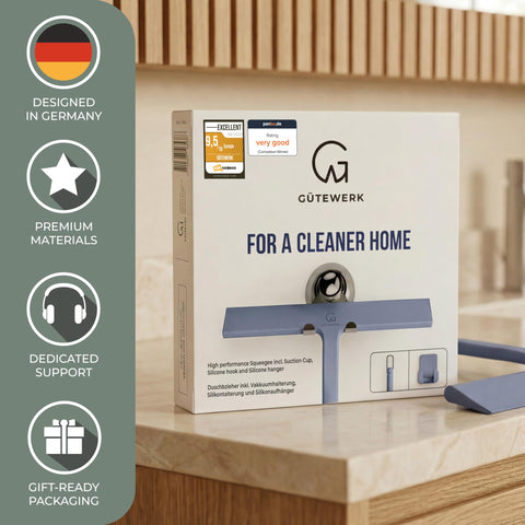GÜTEWERK in use on a glass shower door for fast water removal