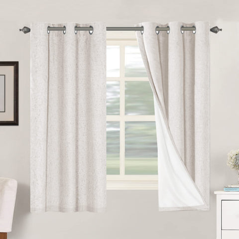 H.VERSAILTEX front view of ivory curtain pair showing full blackout benefit