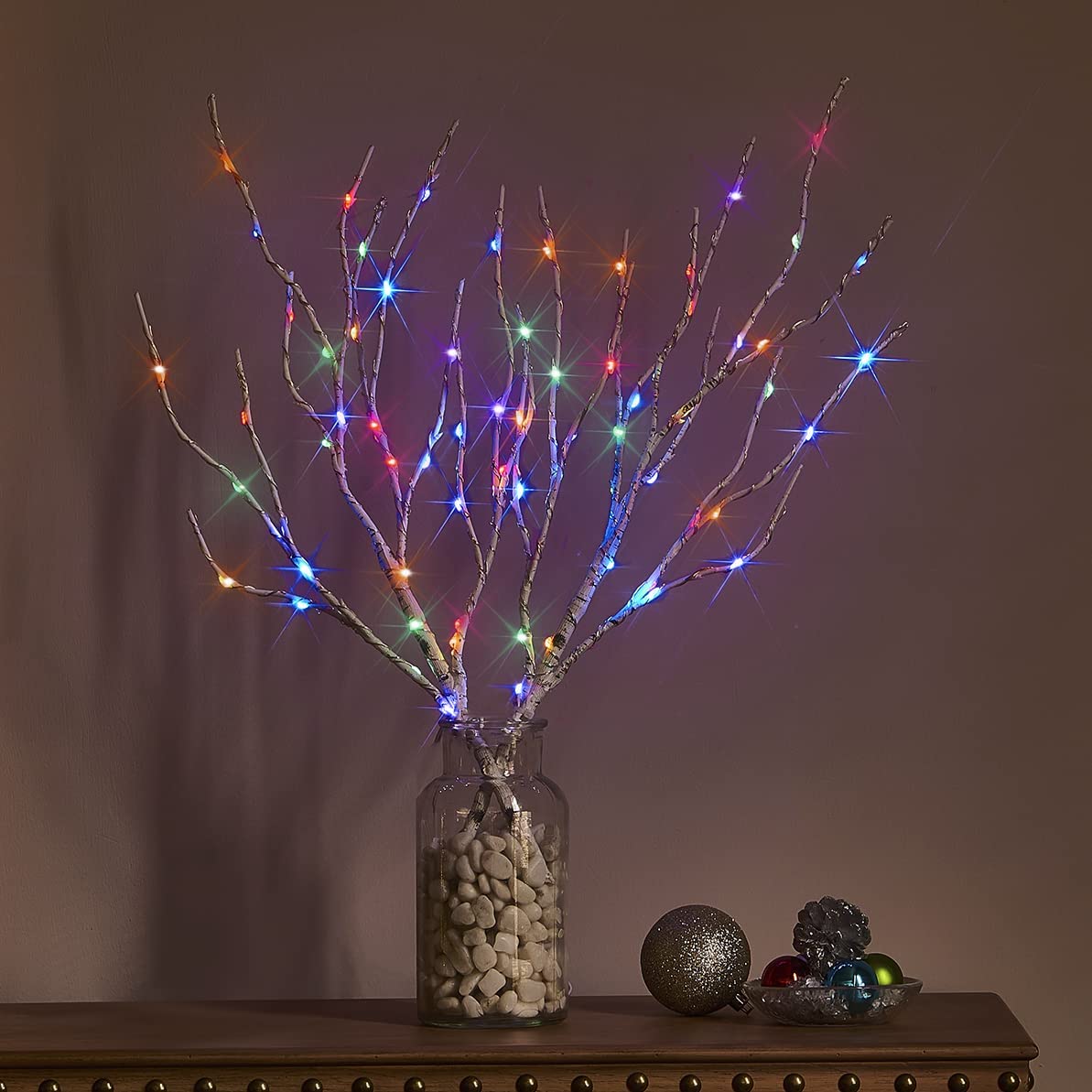 Hairui branches styled in vase as centerpiece offering easy decorative solution benefit