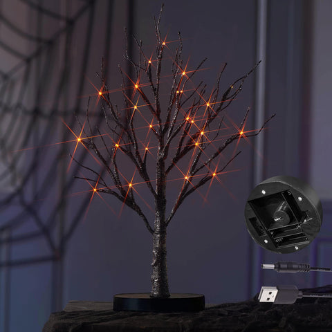 Hairui front view showing black glitter tree on tabletop, adds spooky ambiance