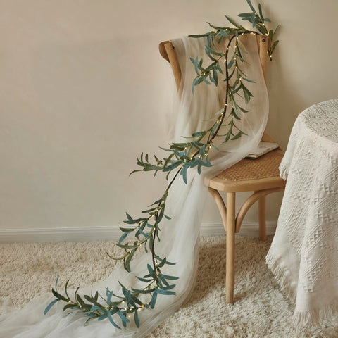 Hairui garland lit in evening creating warm soft glow