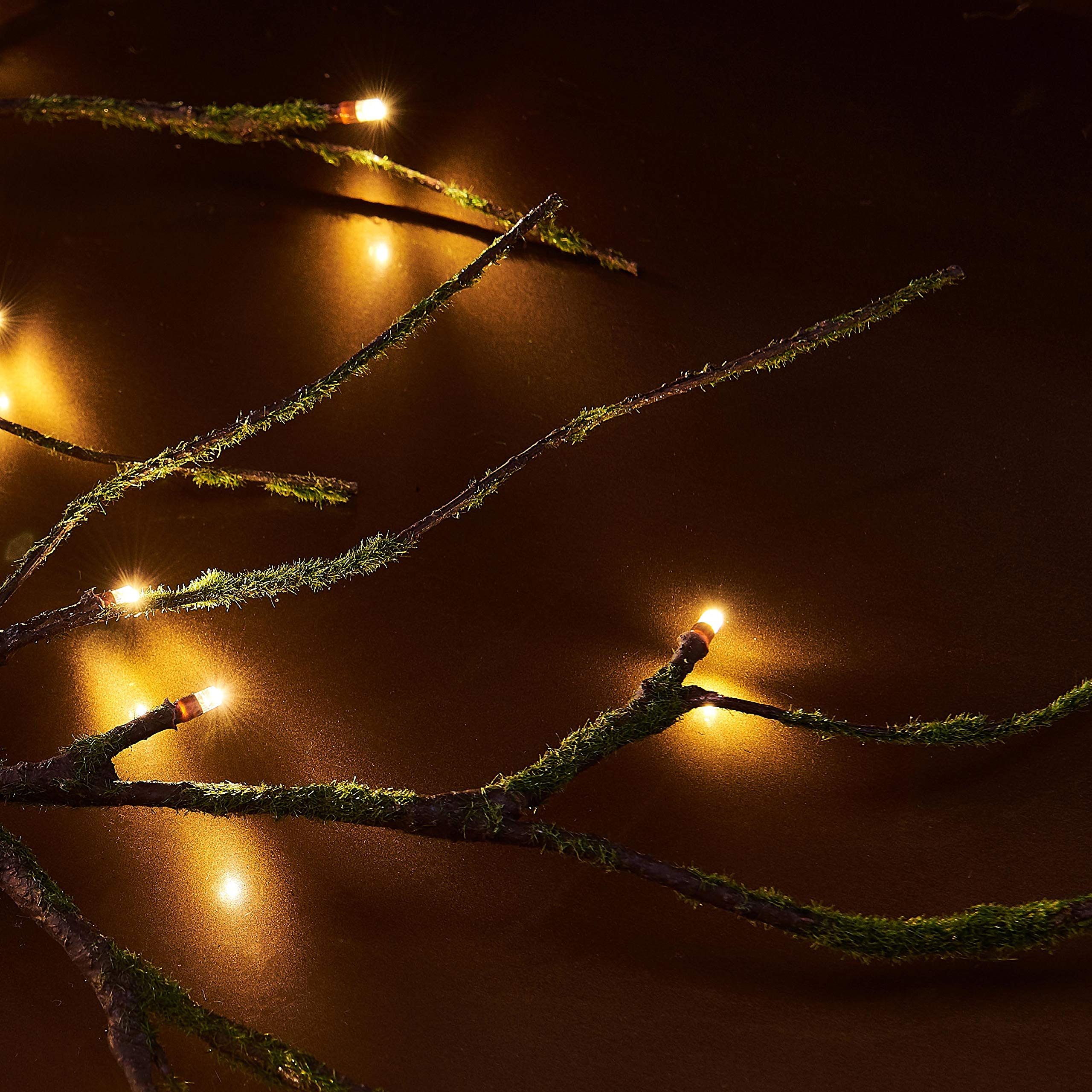 Hairui garland used in a table centerpiece adding soft, decorative lighting