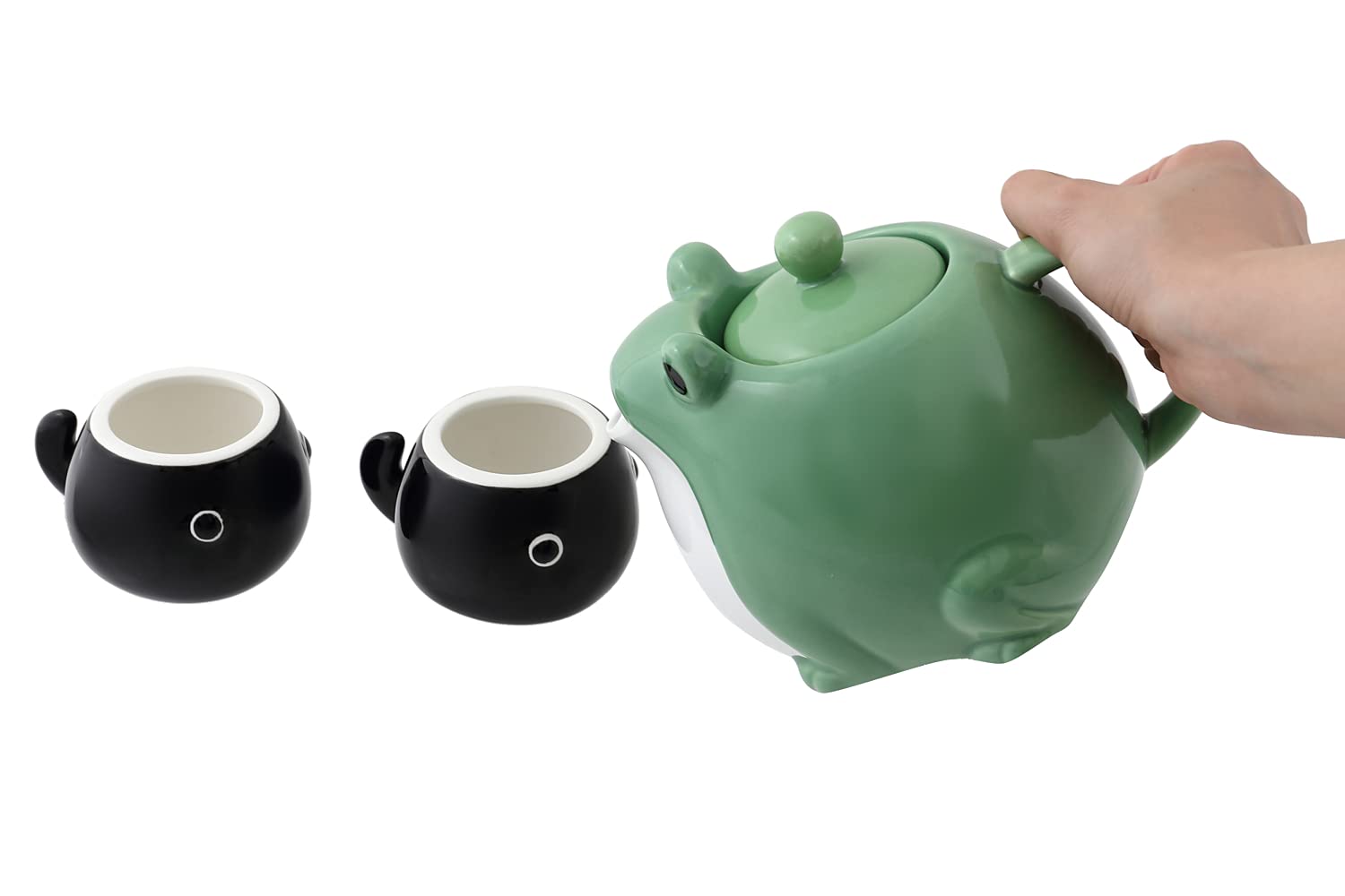 HAKONE YOSEGI teapot beside a standard mug for size comparison, illustrating the 30 oz capacity