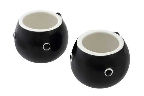HAKONE YOSEGI pouring tea from teapot into cup, demonstrating smooth flow and practical use