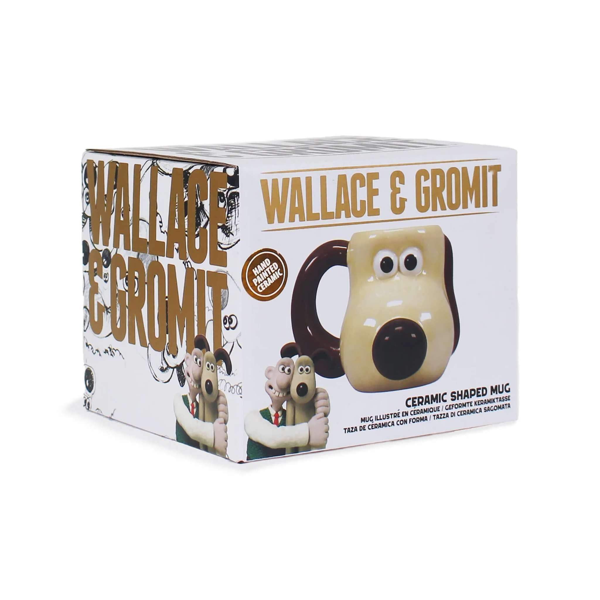 Half Moon Bay Gromit beside standard mug showing true 16oz capacity