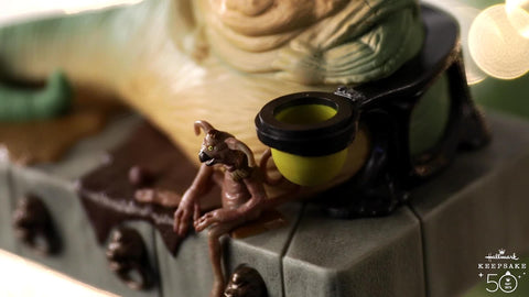 Hallmark Jabba ornament hung on Christmas tree adding fan-focused décor