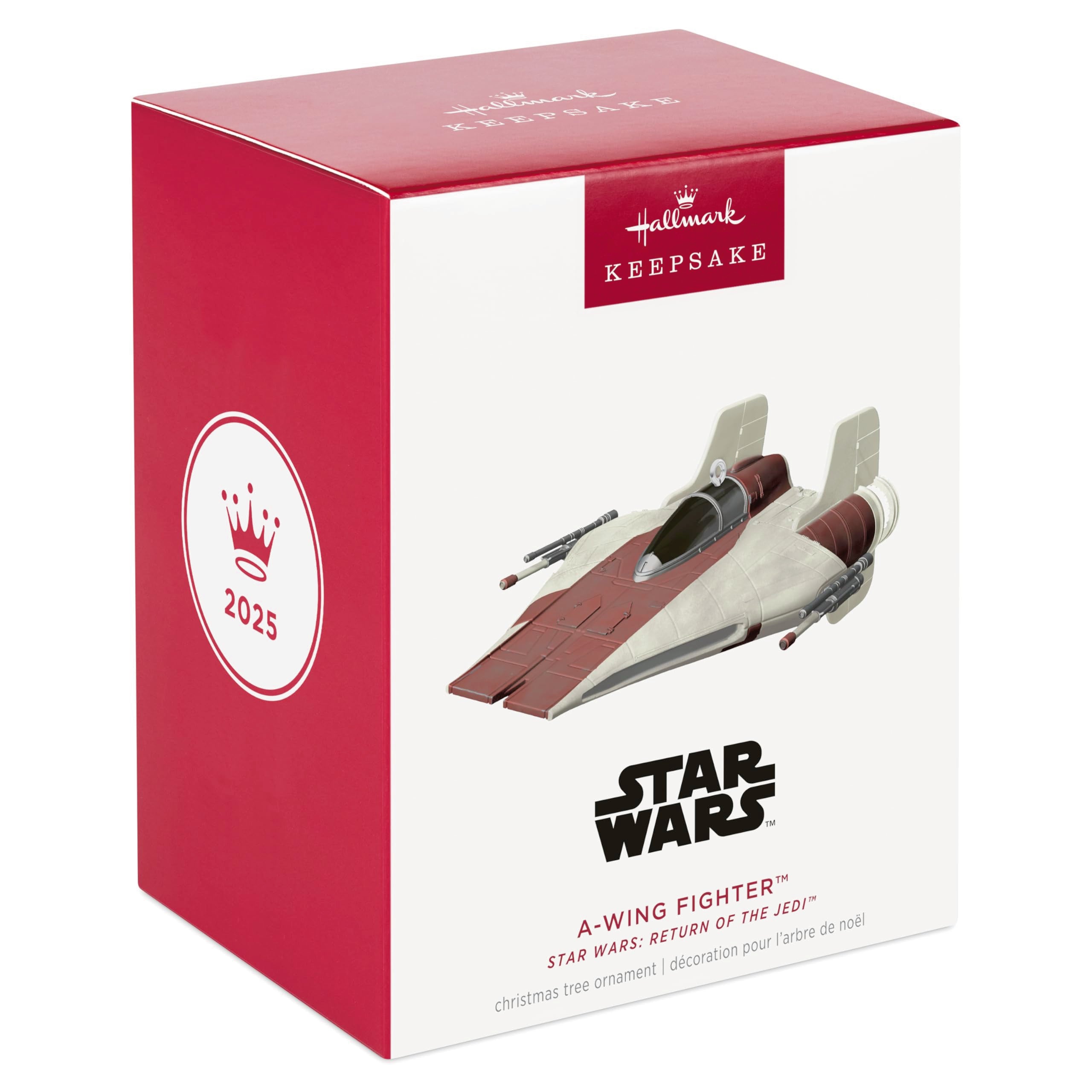 Hallmark Keepsake A-Wing hanging on a Christmas tree adding themed festive flair