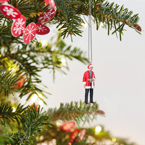 Hallmark Keepsake Clark Griswold hanging on a tabletop tree adding playful charm