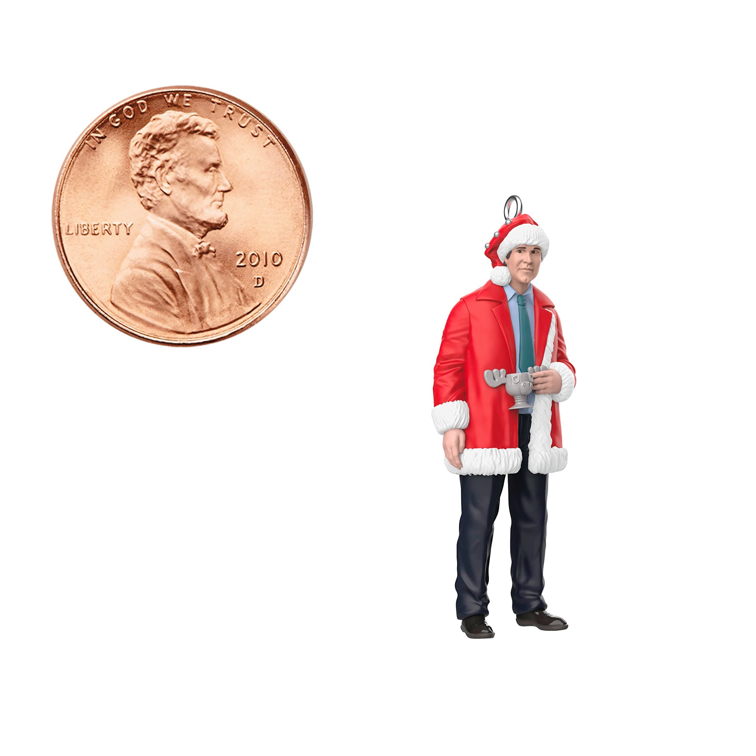 Hallmark Keepsake Clark Griswold beside a coin for scale clarifying size