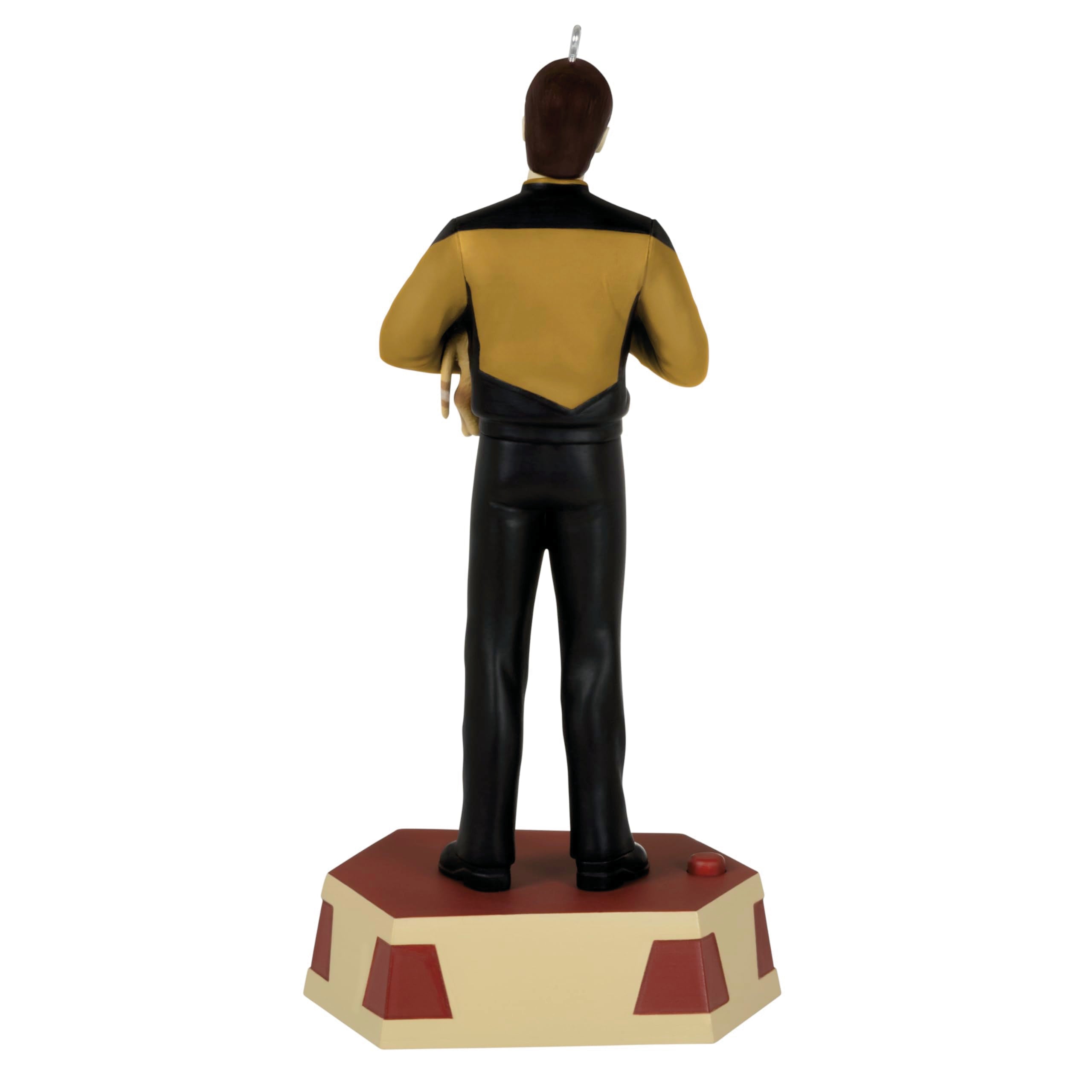 Hallmark Keepsake ornament next to coin for size reference and compact display benefit