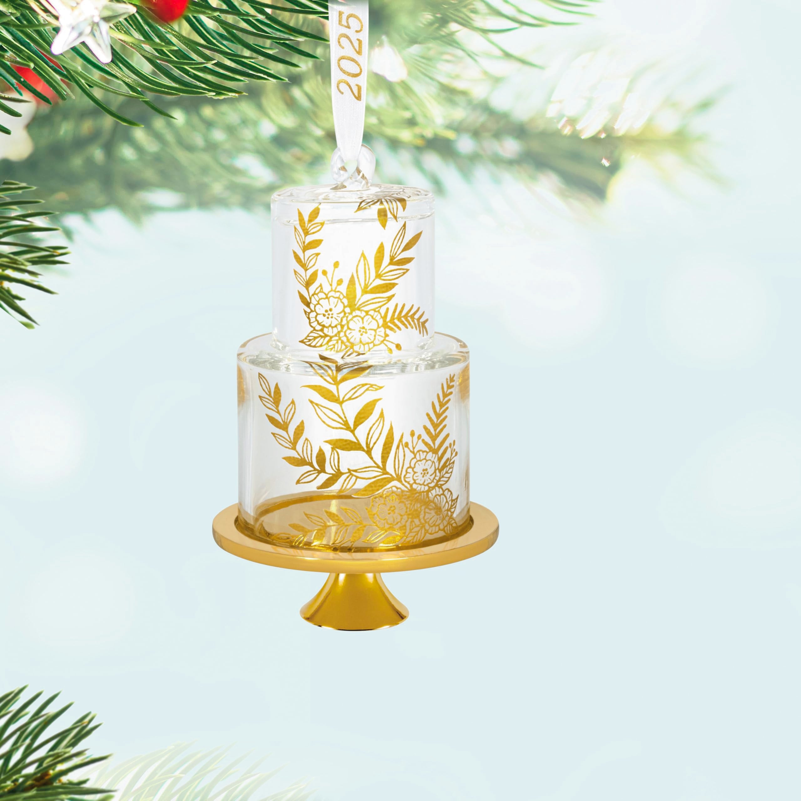 Hallmark Keepsake side profile of ornament highlighting layered cake silhouette and shine