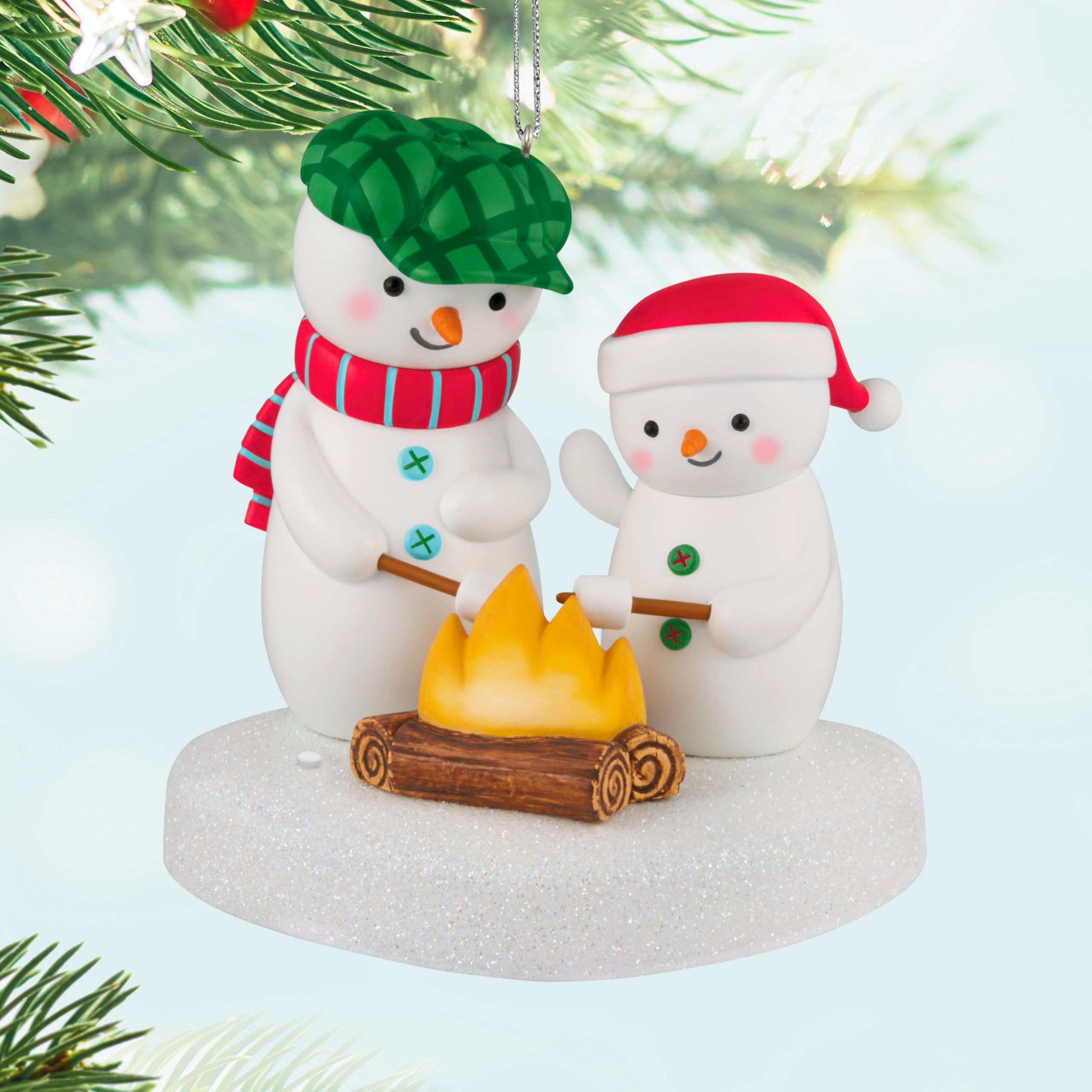 Hallmark Keepsake detail of roaring fire and marshmallows showing realistic sculpting benefit