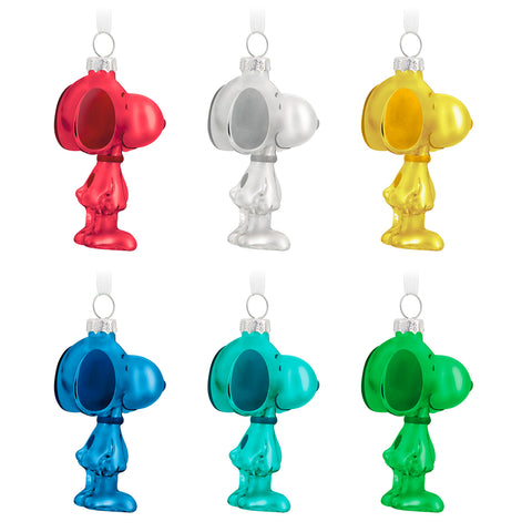 Hallmark Keepsake six colored Snoopy ornaments hanging on a decorated tree for festive color