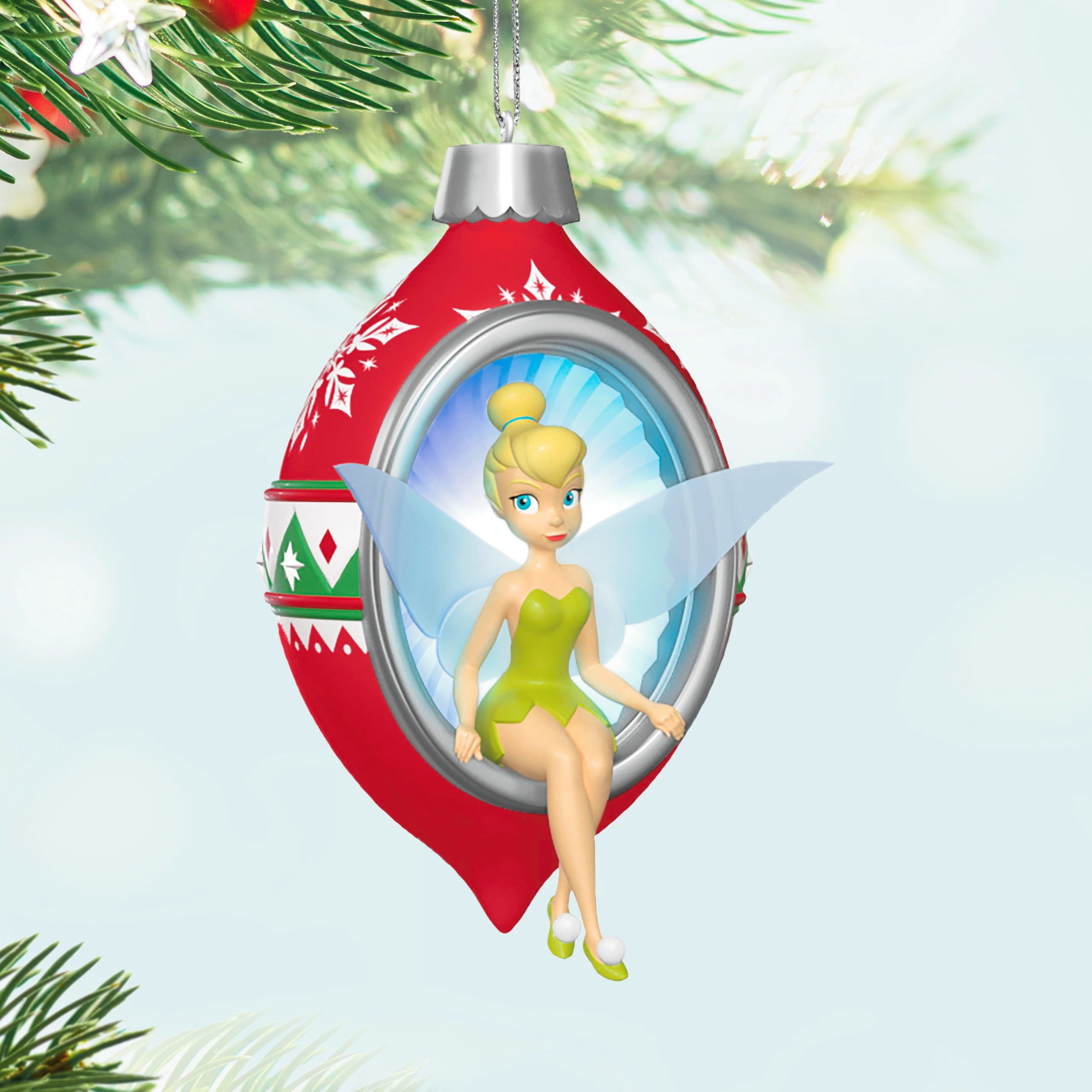 Hallmark Keepsake ornament lit up on a bauble showing warm illumination effect