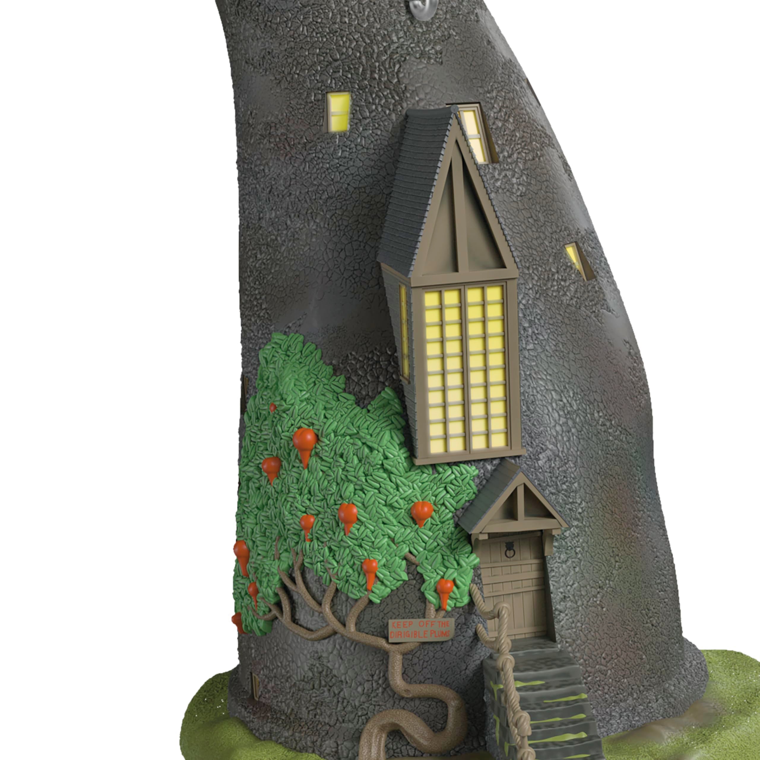 Hallmark Keepsake Lovegood House windows glowing with inserted miniature light creating ambiance