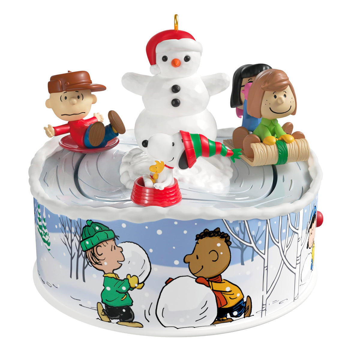 Hallmark Keepsake front view showing Peanuts gang and sledding scene benefit: charming tree focal point