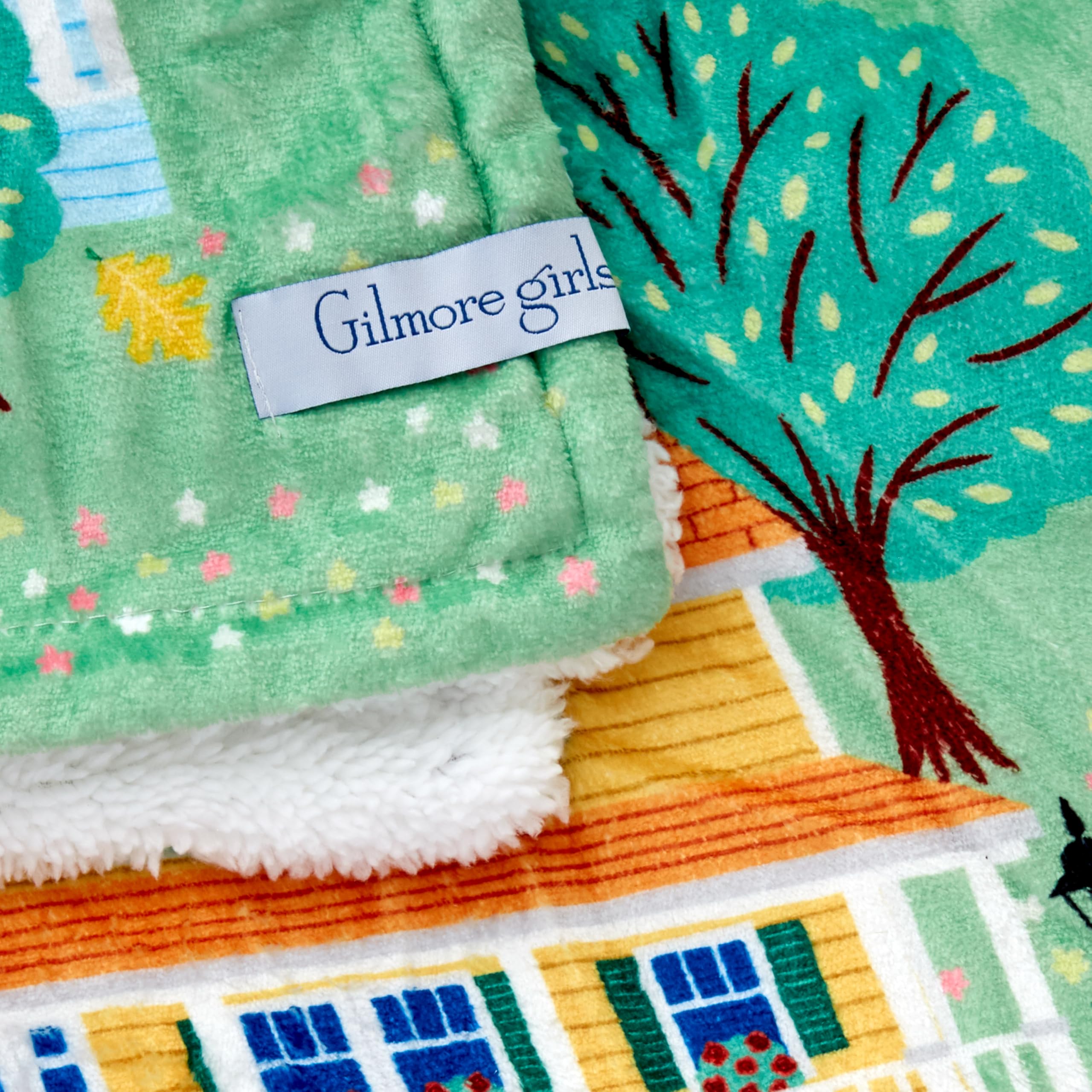 Hallmark blanket in use on couch provides stylish warmth during TV nights
