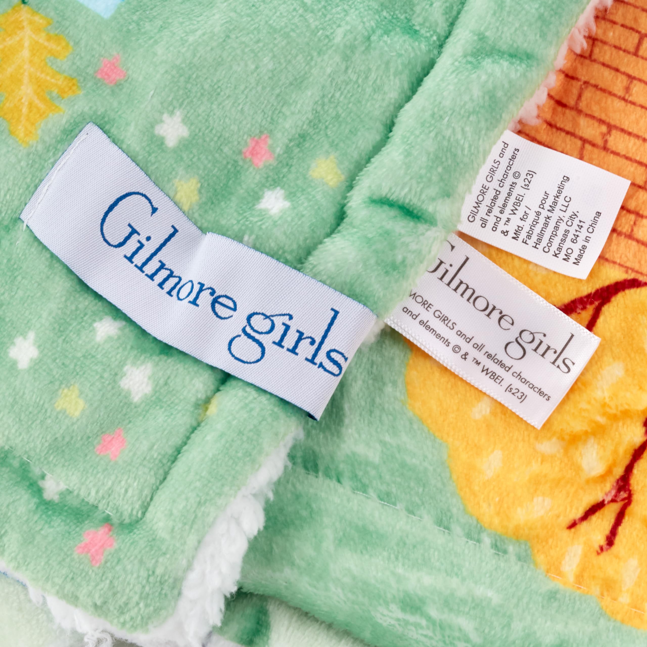 Hallmark blanket draped on chair shows size and scale for one-person lounging