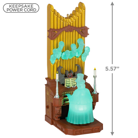 Hallmark Victor Geist beside a hand to show approximate size and scale