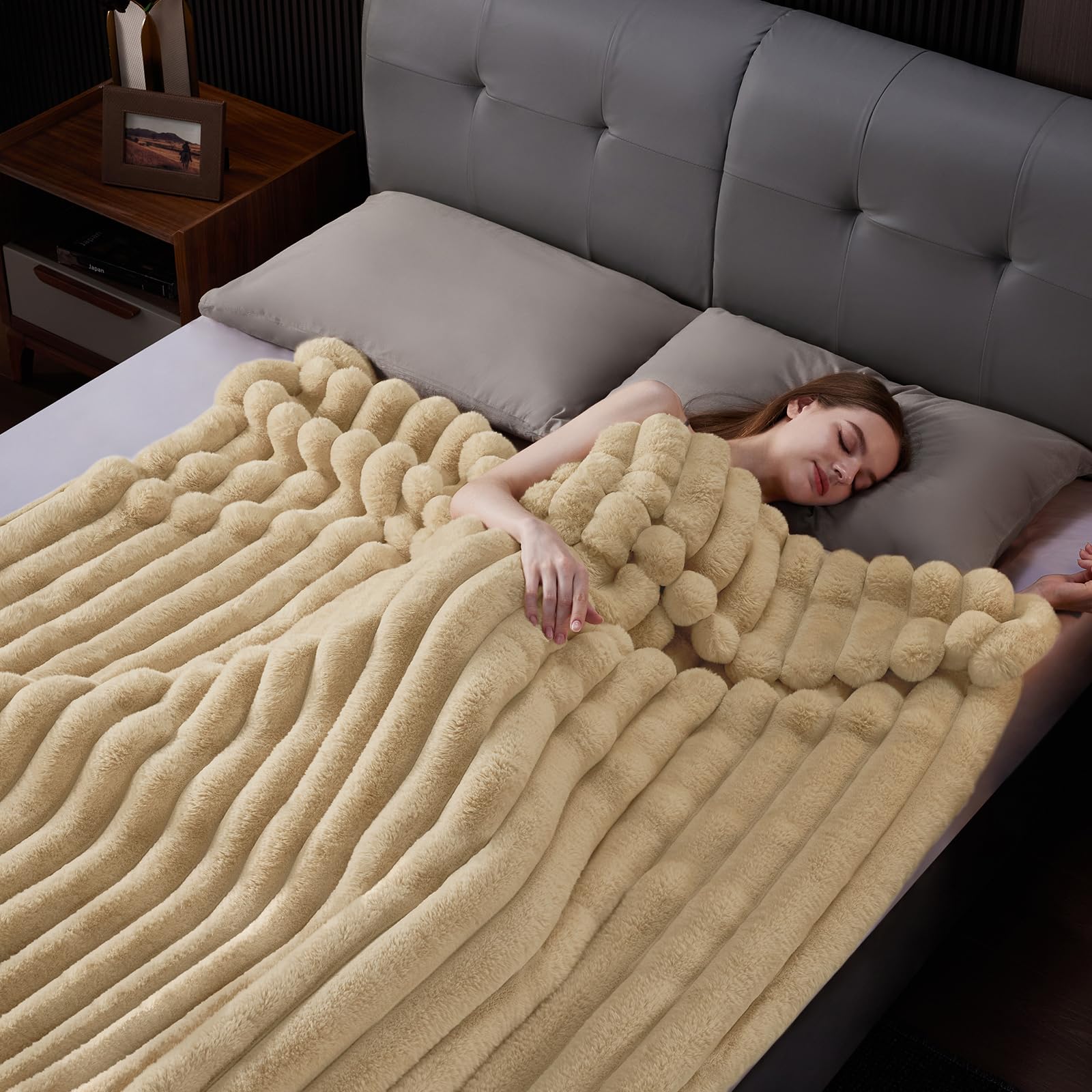 HaloRest throw folded on chair to show 50x70 scale and easy portability