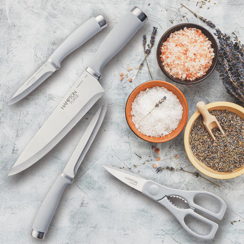 Hampton Forge Epicure knives laid out with ruler showing blade lengths for size and purpose