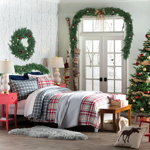 Hananona garland in entryway creating welcoming evergreen ambiance