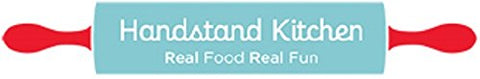 Handstand Kitchen Hello Kitty cupcakes on plate, finished treats ready to share