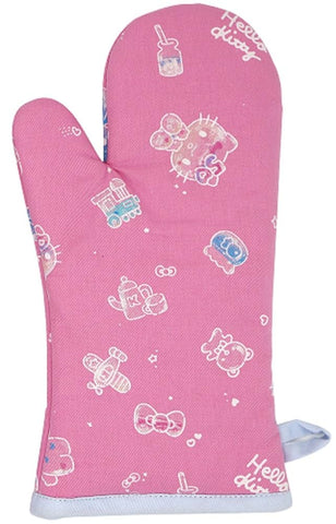 Handstand Kitchen apron and mitt arranged in kitchen setting adding playful decor