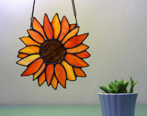 HAOSUM sunflower hanging in window creating colorful light and mood