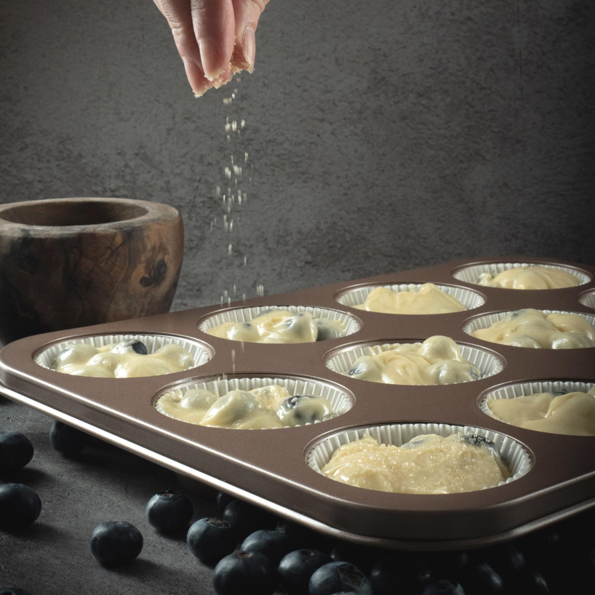 HAPPIELS champagne gold pan styled on counter conveying elegant kitchen presentation