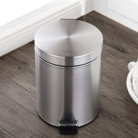 happimess size comparison next to chair illustrating compact 8-gallon footprint