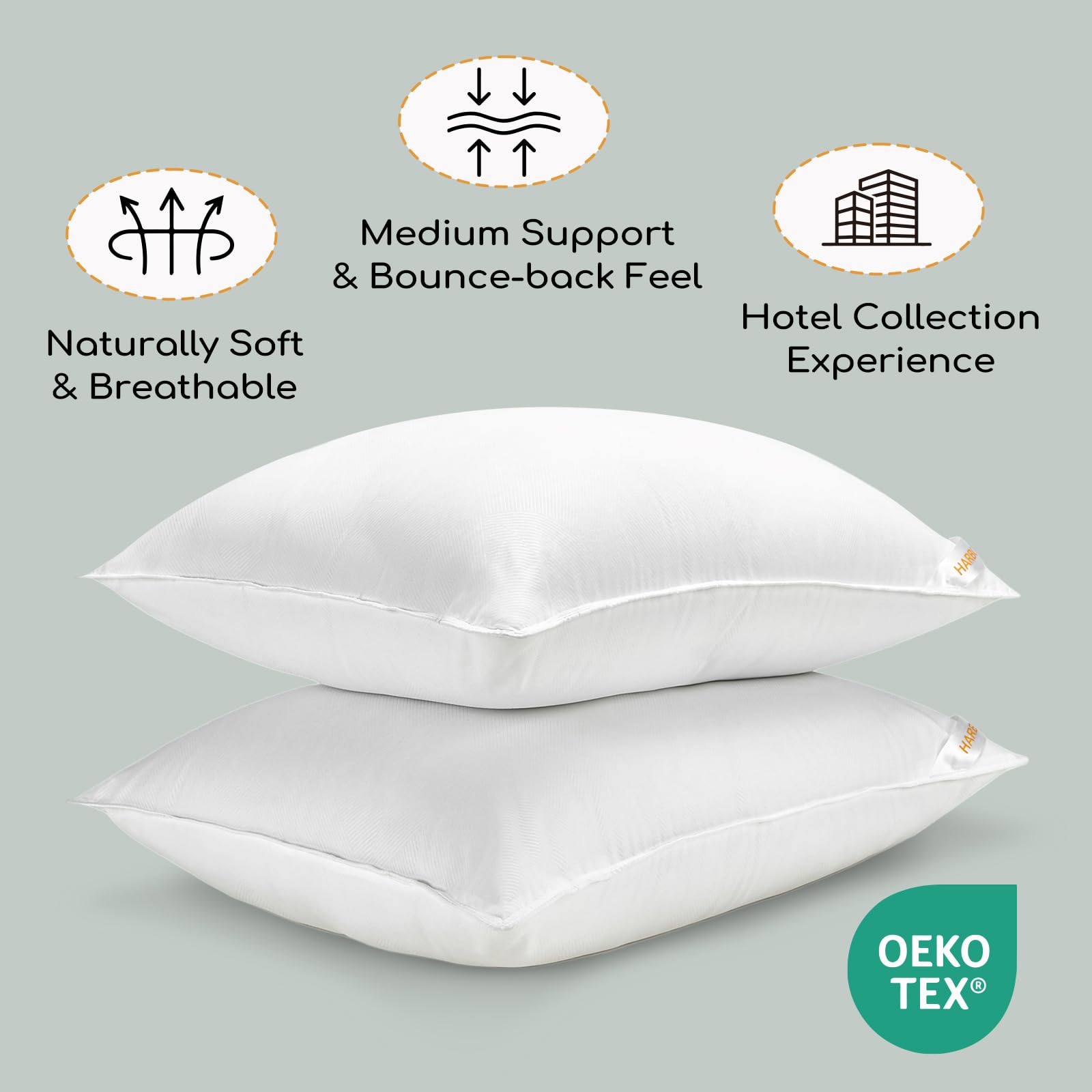 HARBOREST pillows styled on a made bed demonstrating decorative hotel aesthetic