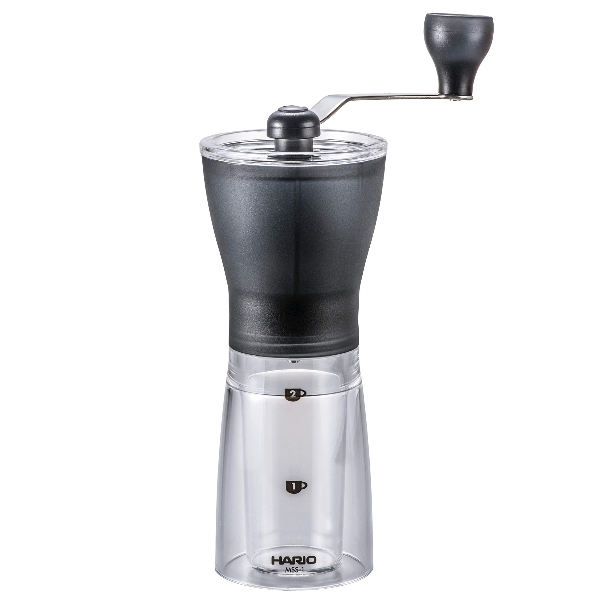 HARIO front view showing compact black grinder and clear bottle, saving counter space