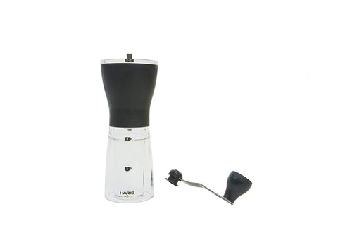 HARIO on kitchen countertop with brewed coffee, highlighting fresh-ground flavor