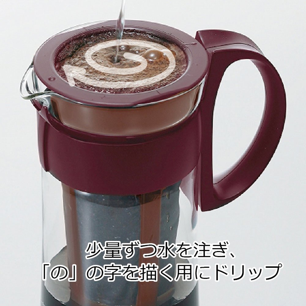 HARIO Mizudashi pouring coffee into glass with slender spout for controlled pour