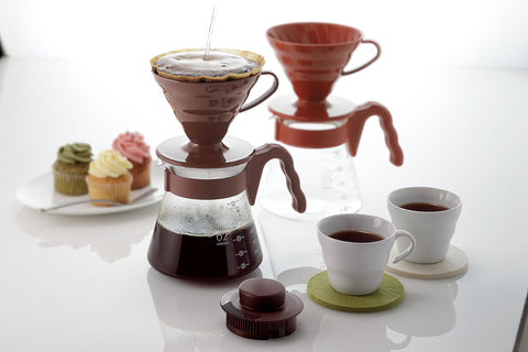HARIO V60 beside a mug showing 700mL server capacity and scale comparison
