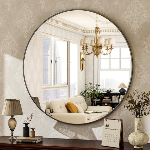 HARRITPURE front view of 24-inch round mirror adding modern contrast