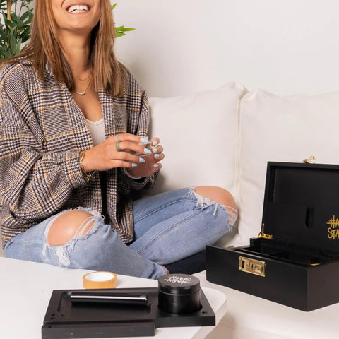 HASHSTASH box next to phone showing size and tabletop storage suitability