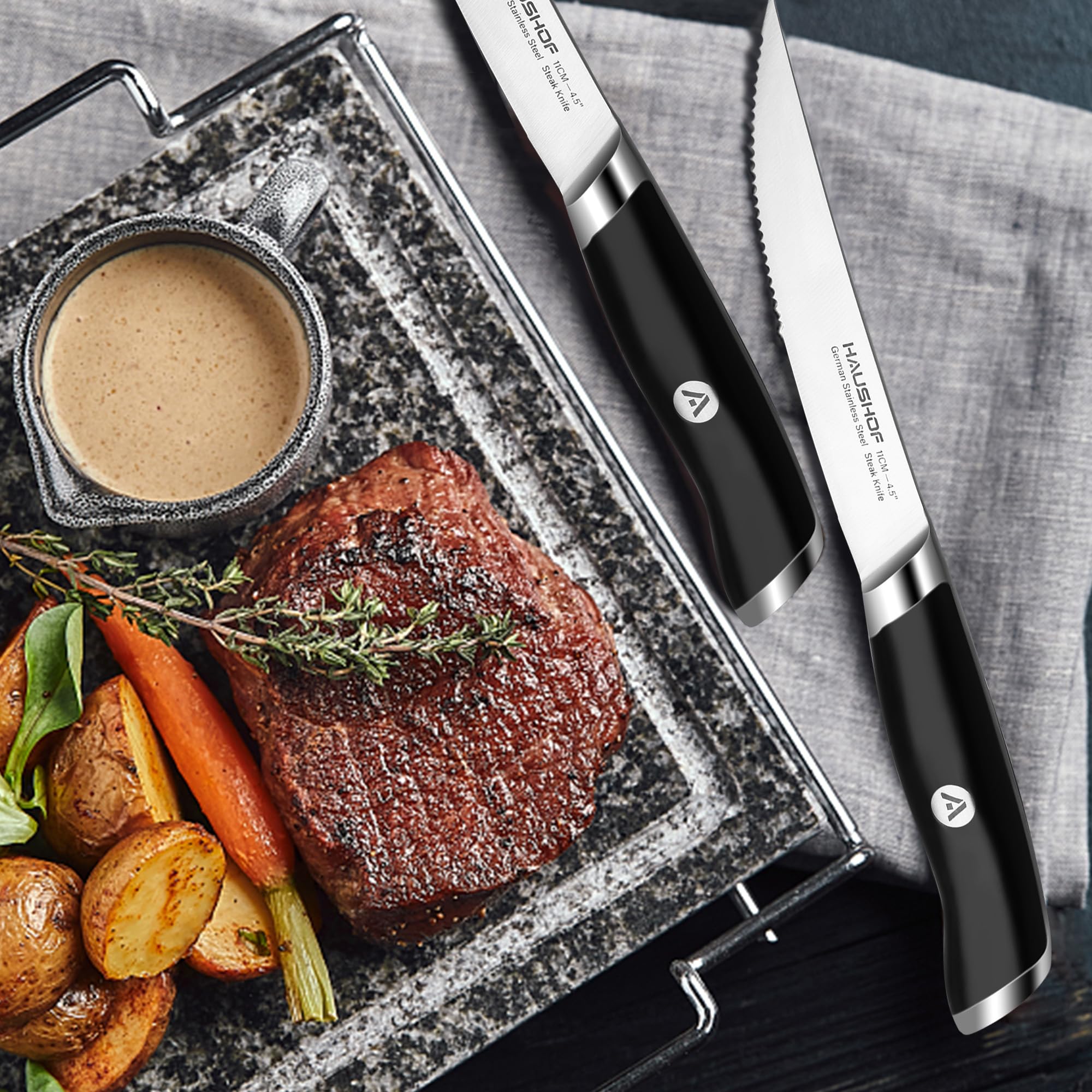 HAUSHOF knives on table setting with steak and sides showing presentation-ready dinner benefit elegant serving