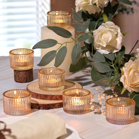 HAVITI lit tealight in gold holder emitting warm ambient glow for atmosphere