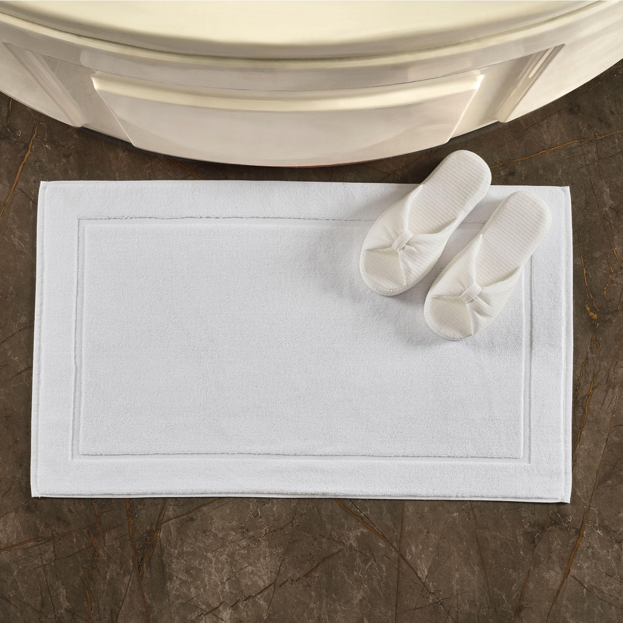 Hawmam Linen neatly folded pair demonstrating compact storage and rotation option