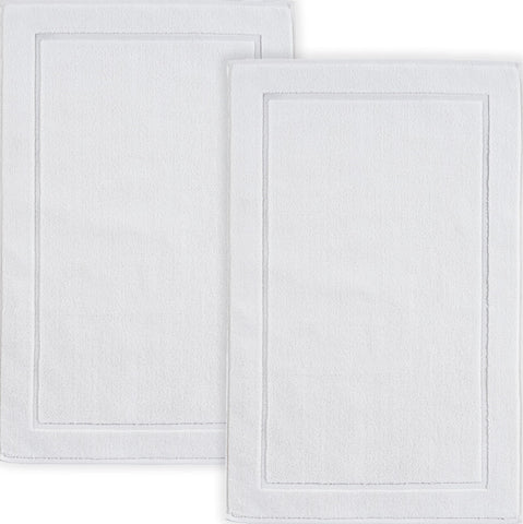 Hawmam Linen front view of two white bath mats showing banded design and clean look