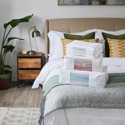 Hayden Hill bedroom scene with sweater bag for organized linen closet