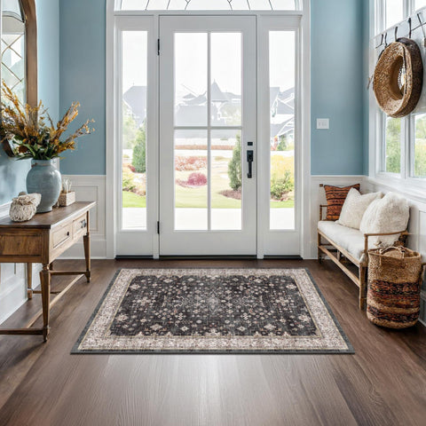 Hazo Haus front view of black boho rug showing pattern and benefit of stylish entry accent